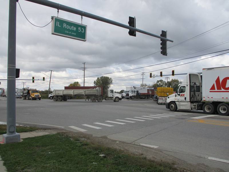 Semitrailers enter the busy Route 53 intersection at Laraway Road in Joliet.