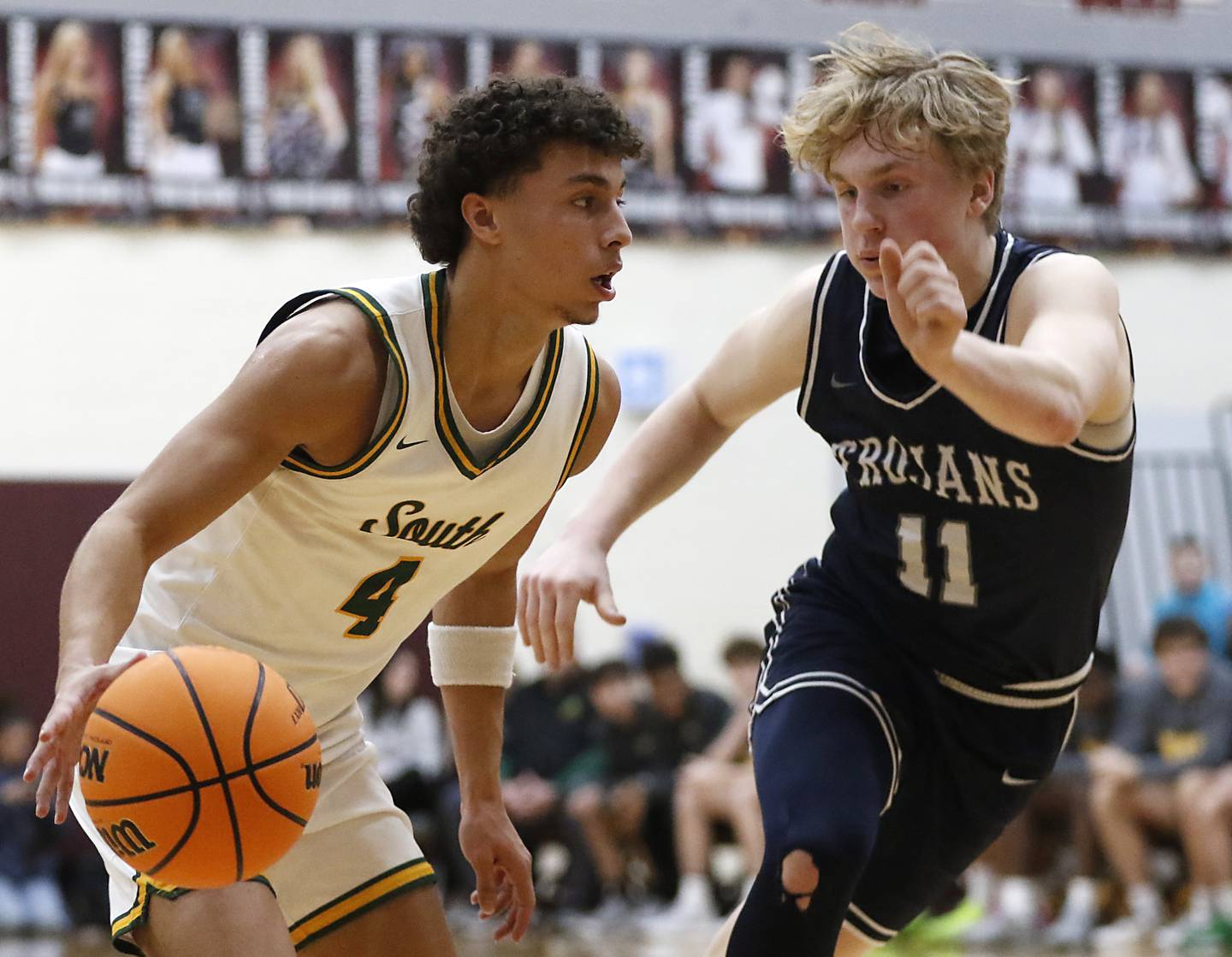 Crystal Lake South's Anthony Demirov pushes the ball up the court against Cary-Grove's Landon Nawracaj during the IHSA Class 3A Prairie Ridge Regional championship basketball game on Friday, Feb. 28, 2025, at Prairie Ridge High School in Crystal Lake.