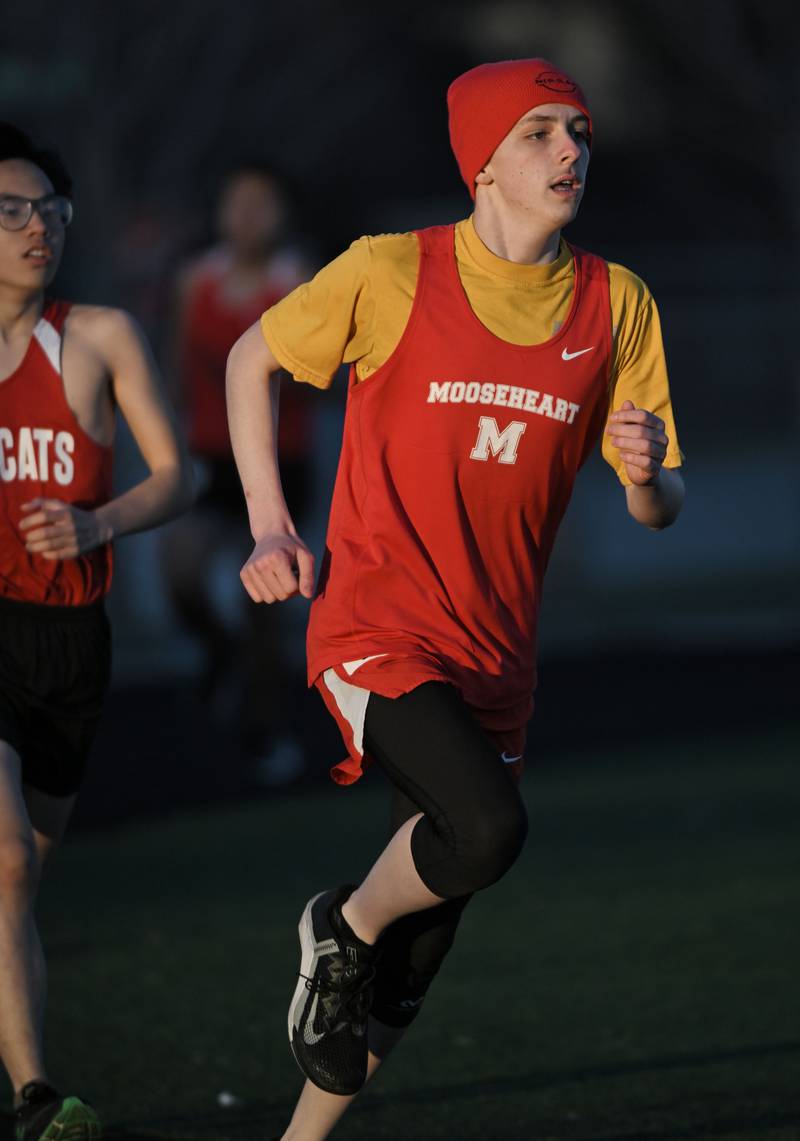 Moosheart’s Anthony Hopkins-Horton runs the 1,600-meter run at the Les Hodge Boys Track and Field Invitational at Batavia High School on Friday, April 5, 2024.