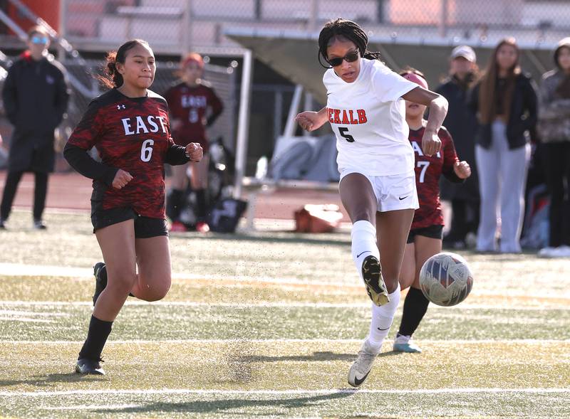 DeKalb's Demi McNeil takes a shot in front of Rockford East's Alondra Razo during their game Tuesday, March 25, 2025, in the Barb Fest tournament at DeKalb High School.