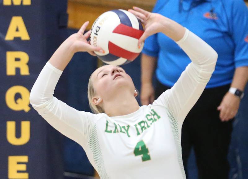 Seneca's Lainie Olson sets the ball in the air against Henry-Senachwine during the Tri-County Conference Championship game on Thursday, Oct. 17, 2024 in Bader Gym at Marquette High School.