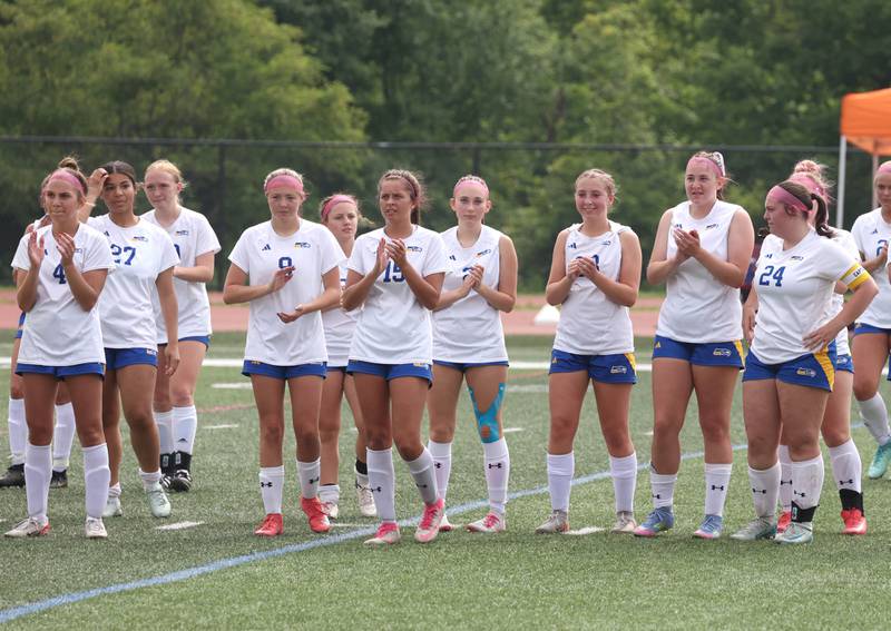 Johnsburg players clap for their fans Saturday, June 7, 2025, after their IHSA Class 1A state championship loss to Columbia at North Central College in Naperville.
