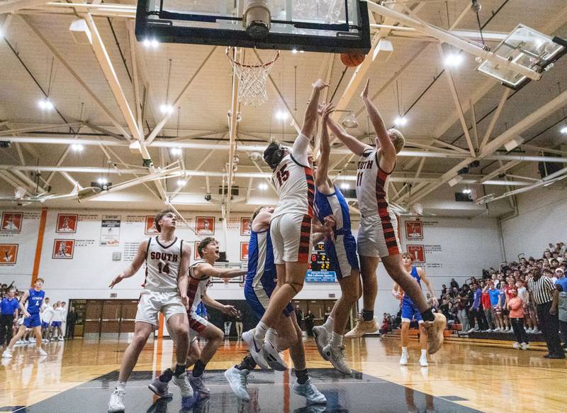 Wheaton Warrenville South’s Zach Rogers goes up for a layup during a game against Geneva High School at Wheaton Warrenville South High School on Tuesday, Dec. 3, 2024.