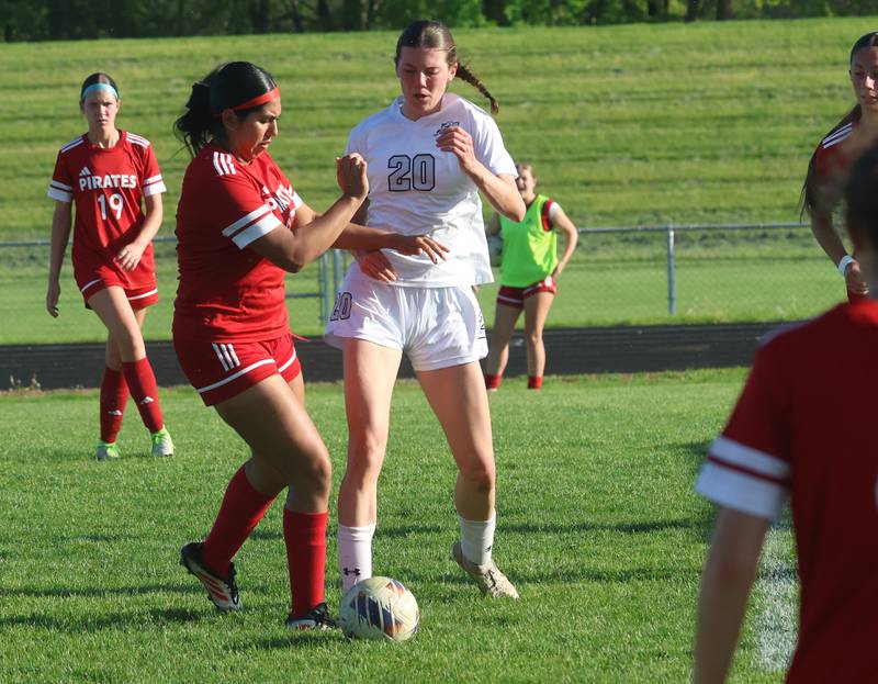 Ottawa's Jasmine Resendez and Kaneland's Erin Doucette go after the ball on Wednesday, April 22, 2026 on King Field at Ottawa High School.