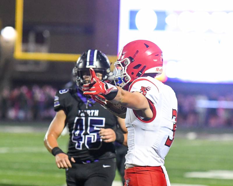 Hinsdale Central's Jack Lesniewicz (3) celebrates by indicating the first down after being pushed out of bounds during the game against Downers Grove North on Friday Sept. 12, 2025, held at Downers Grove North High School.