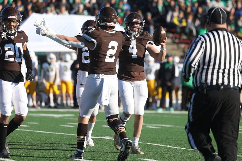 Joliet Catholic’s Nico Ronchetti looks to the referee t confirm his fumble recovery against Providence in the Class 5A semifinal on Saturday, Nov. 18, 2023, in Joliet.