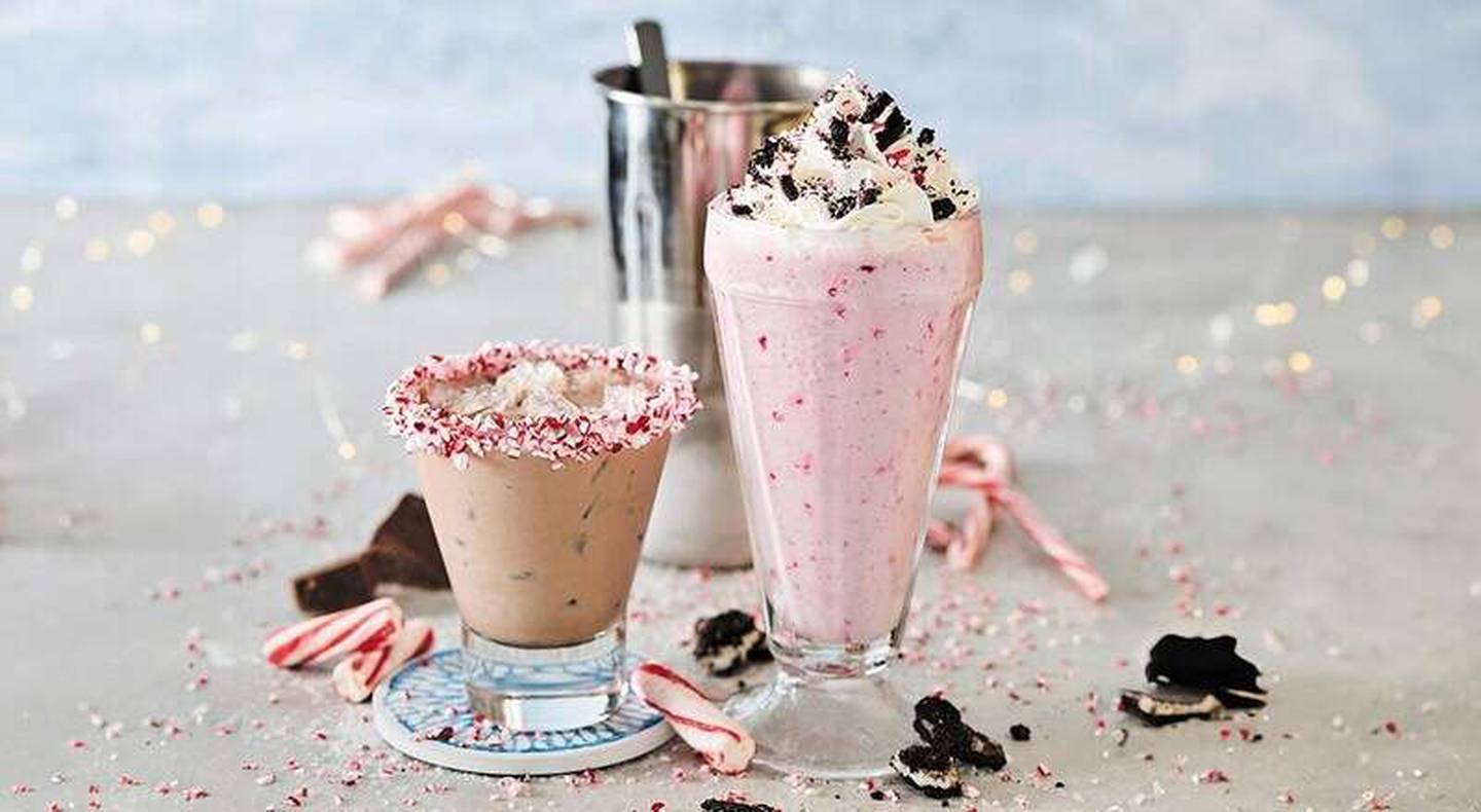 The Tipsy Santa cocktail and Oreo Candy Cane Milkshake are available at participating Red Robin restaurants during the holiday season.