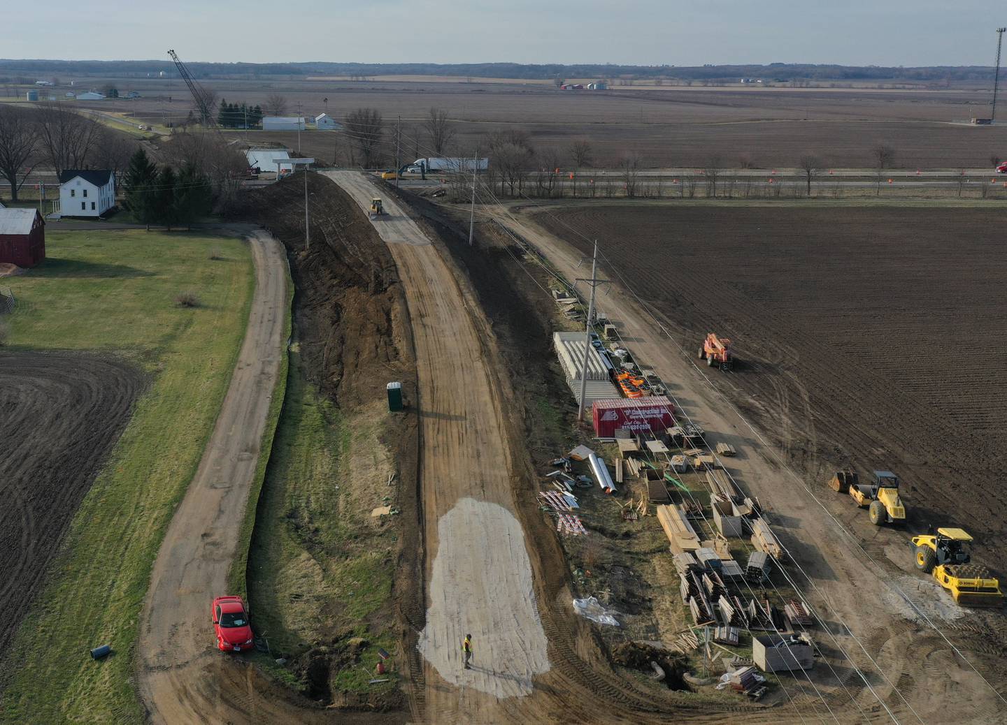 Workers with D Construction build a new overpass on County Road 500 East over Interstate 80 on Tuesday, March 12, 2024  in Bureau County. The Illinois Department of Transportation announced a two-year, $36.8 million construction project on nearly 10 miles of Interstate 80 in Bureau County. Resurfacing will take place on I-80 from the Bureau-Henry County line to east of the Route 40 interchange (exit 45).