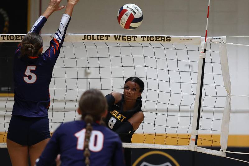 Joliet West’s Eden Eyassu hits a shot past the defense of Romeoville on Thursday, Sept. 5, 2024 in Joliet.