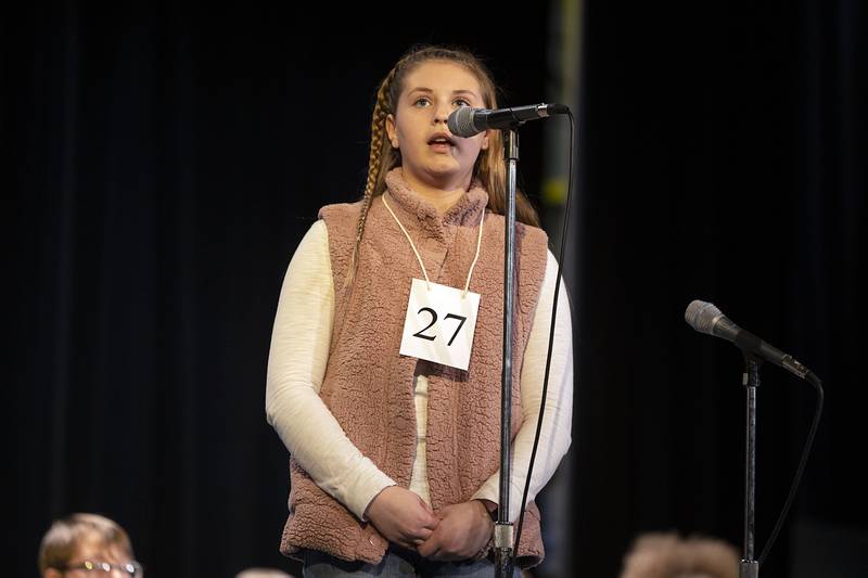 Oregon Jr. High School seventh grader Kendall Boyle appears on stage Thursday, March 9, 2023 during the Lee-Ogle-Whiteside Regional Spelling Bee.