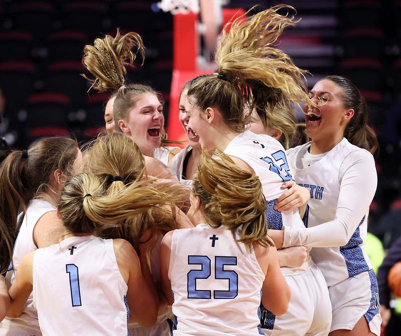 Nazareth Academy celebrates their win over Lincoln during the IHSA Class 3A girls basketball championship game at the CEFCU Arena on the campus of Illinois State University Saturday March 4, 2023 in Normal.