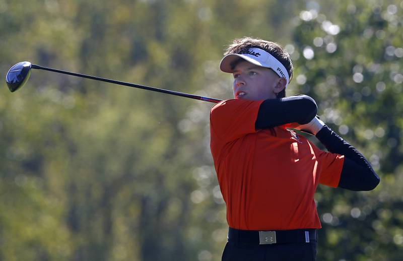 Crystal Lake Central’s Jack Bice watches his tee shot on the ninth hole during the IHSA Class 3A Dundee-Crown Regional golf tournament on Wednesday, Oct. 2, 2024 at Randall Oaks Golf Club in West Dundee.