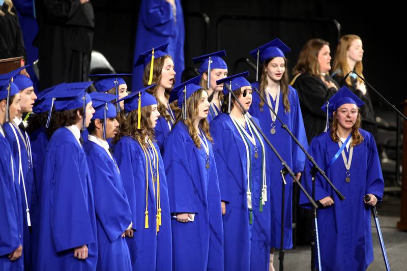 St. Charles North senior choir members perform during the school’s 2025 commencement ceremony on Thursday, May 22, 2025 at Northern Illinois University in DeKalb.
