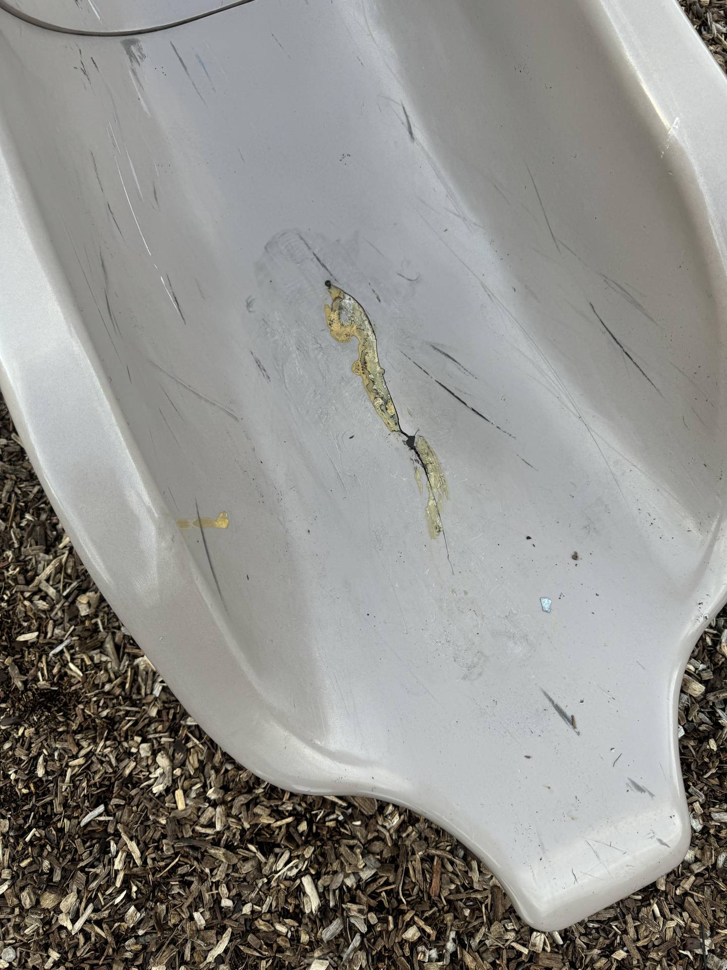 A chipped and cracked slide at the District 300 Neubert Elementary playground in Algonquin.
