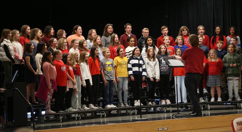 The fifth and sixth grade choirs sing "Let Freedom Sing" during the annual Veterans Day Program on Monday, Nov. 11, 2024 at Parkside Middle School in Peru.