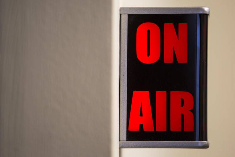 An illuminated "On Air" sign is seen Thursday at University of St. Francis in Joliet. WCSF 88.7 FM, the university's radio station, is celebrating its 30th anniversary.