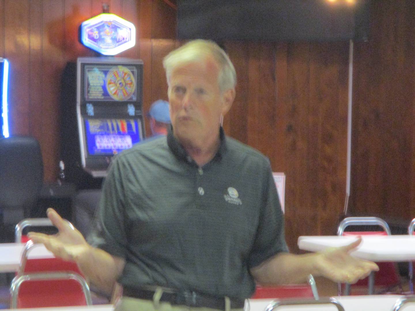 Joliet Catholic Academy alum Mike Hansen discusses the stadium project at a neighborhood meeting held Wednesday in Joliet. June 18, 2025