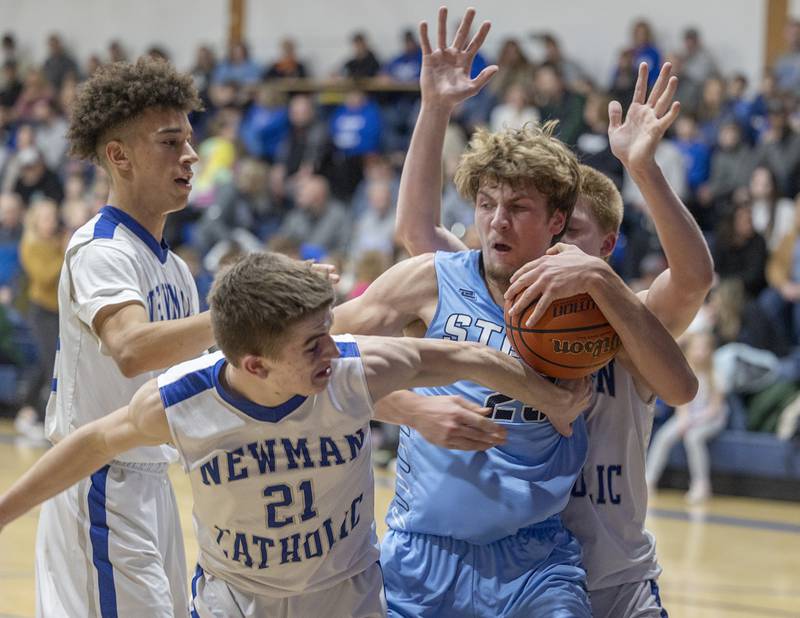 Bureau Valley’s Landon Hulsing secures a rebound against Newman Friday, Jan. 26, 2024 at Newman High School.