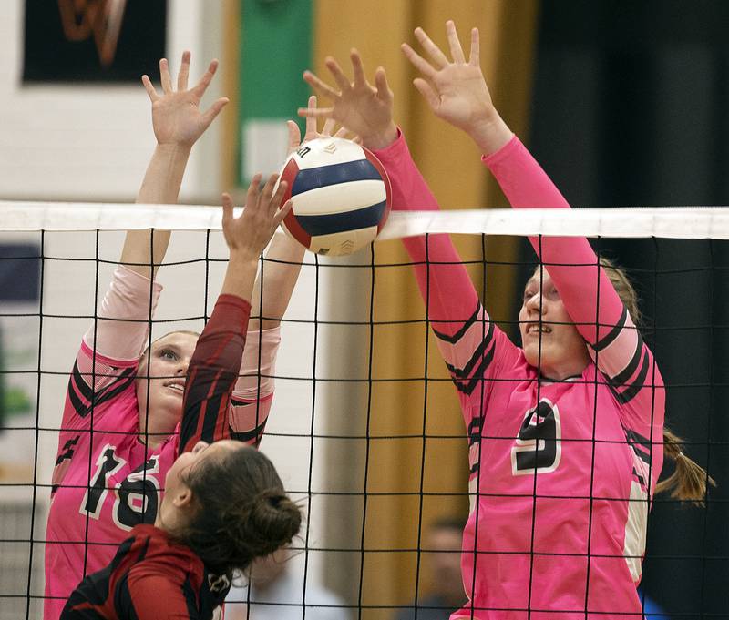 Rock Falls’ Taylor Segneri (left) and Kayla Hackbarth work the net against Stillman Valley Tuesday, October 8, 2024 at Rock Falls High School.