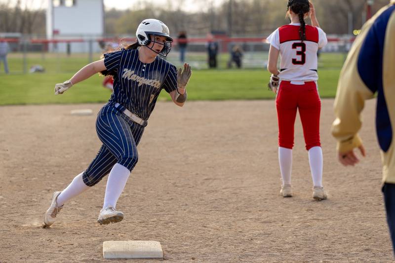 Makayla Backos (9) of Marquette runs to third base on Wednesday, April 16, 2025 at Streator High School in Streator.