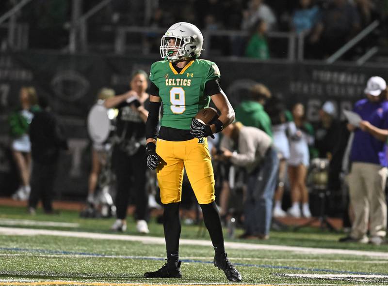 Providence Catholic's Curtis Stubbs Ii (9) reacts after making a big catch during the non-conference game against St. Francis on Friday, SEP. 26, 2025, at New Lenox.