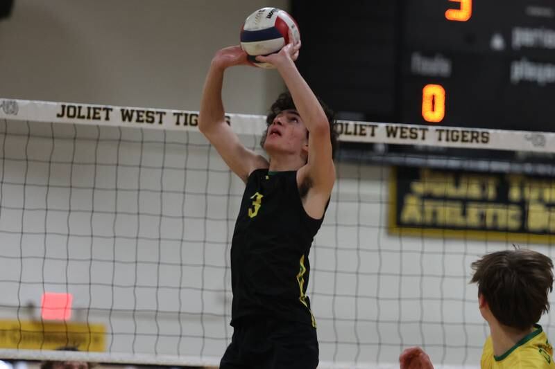 Providence’s Nico Krabbe sets the ball against Joliet West on Thursday, March 23, 2023 in Joliet.