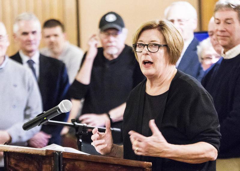 Surrounded by past Citizens of the Year, Dixon's 2019 Citizen of the Year Robin Canode speaks after receiving the award Friday during the Best of Dixon Awards at the Post House Ballroom in Dixon.
