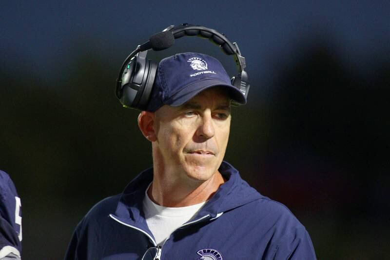 Cary-Grove’s Head Coach Brad Seaburg guides the Trojans against Jacobs in varsity football on Friday, Sept. 20, 2024, at Al Bohrer Field on the campus of Cary-Grove High School in Cary.