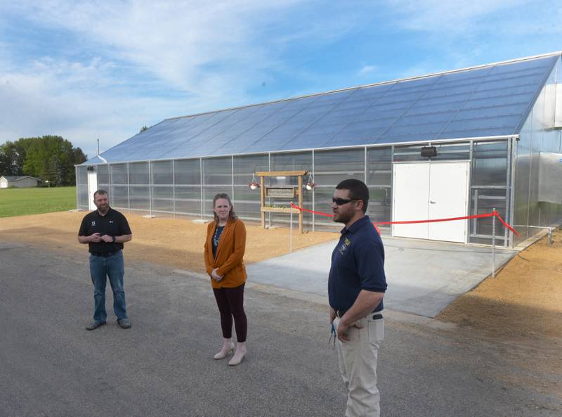 Steve Shaffer, president of the Polo FFA Alumni and Polo High School Agriculture Education teachers and FFA Advisors Stephanie Schultz and Alec Wetzell speak about Polo High School's new greenhouse at its official ribbon cutting  on Wednesday, May 1, 2024. The 42'x72' structure is located just to the east of the Ag shop at Polo High School.