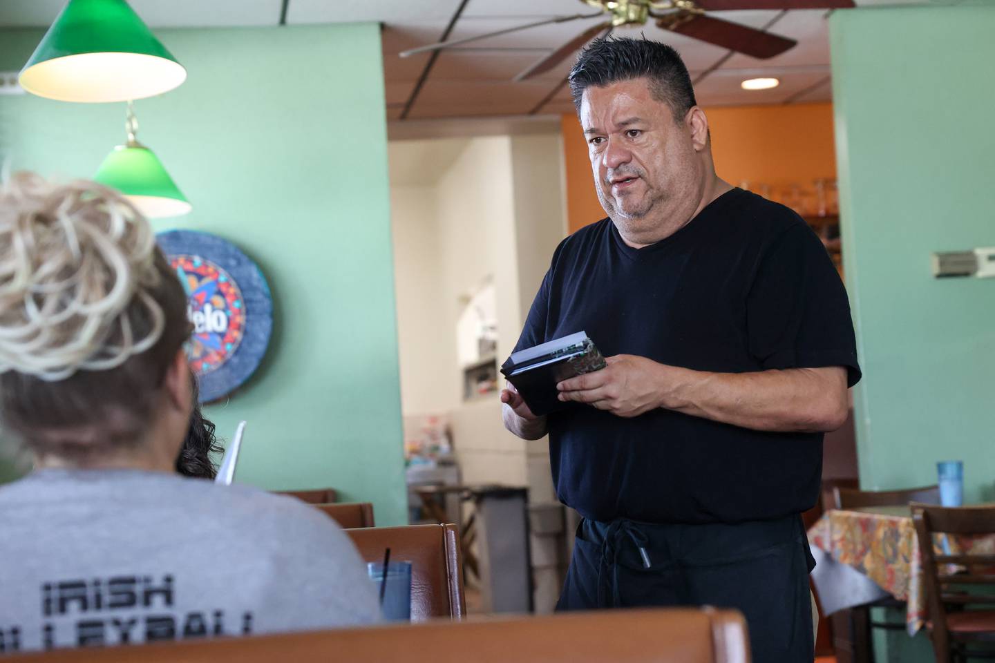 Homero Trevino takes a customer's order at La Siesta in Bradley on Tuesday,  July 29, 2025. After 27 years in business, the longtime Bradley restaurant's final day will be Saturday, Aug. 9.