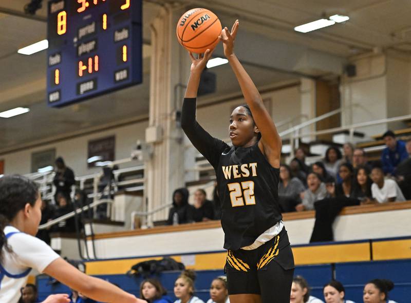 Joliet West's Makayla Chism (22) shoots a jump shot during the non-conference basketball game against Joliet Central on Monday, Dec 02, 2024 at Joliet.