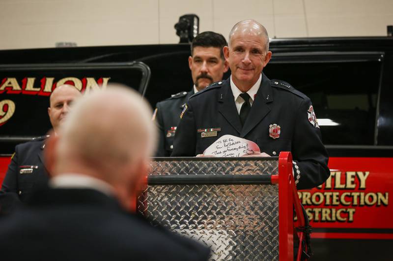 Huntley Fire Protection District Lieutenant Ken Larsen pictured here in November 2022 during a retirement ceremony for Battalion Chief David Eeg.