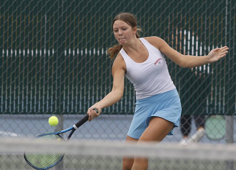 Marian Central’s Kaitlyn Remke returns the ball Thursday, Oct. 19, 2023, during the first day of the IHSA State Girls Tennis Tournament at Hersey High School in Arlington Heights.