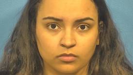 Joliet police seek woman accused of money laundering, vehicle fraud