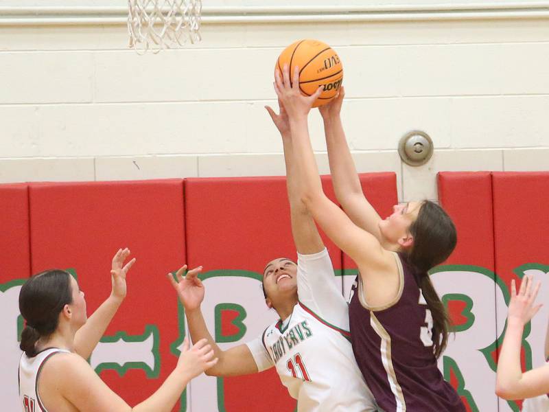 Morris's Lily Hansen eyes the hoop as L-P's Giavanna Grebner defends on Monday, Feb. 9, 2026 in Sellett Gymnasium at L-P High School.