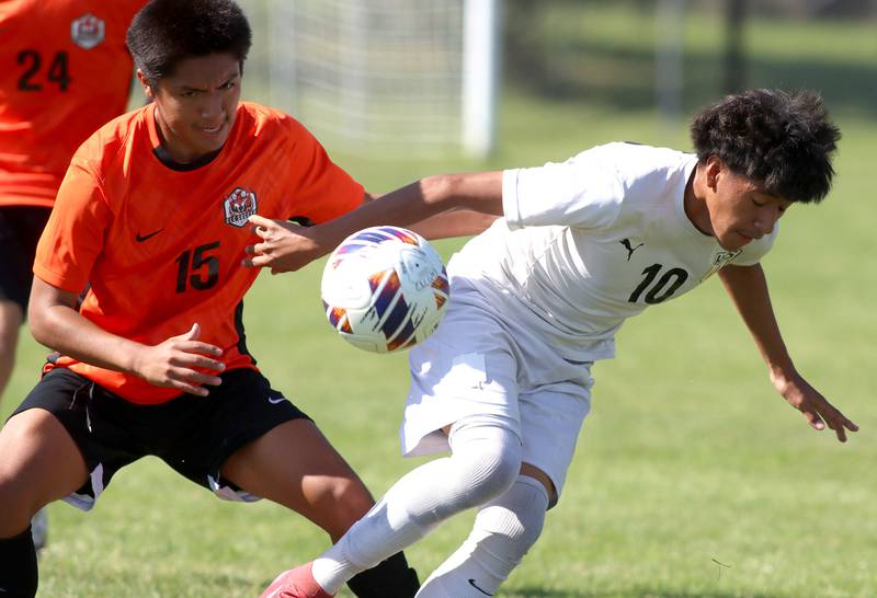 Crystal Lake Central’s  Angel Perez, left, battles Harvard’s Bryan Gorostieta in varsity boys soccer at Crystal Lake Central High School in Crystal Lake on Saturday, Sept. 6, 2025.