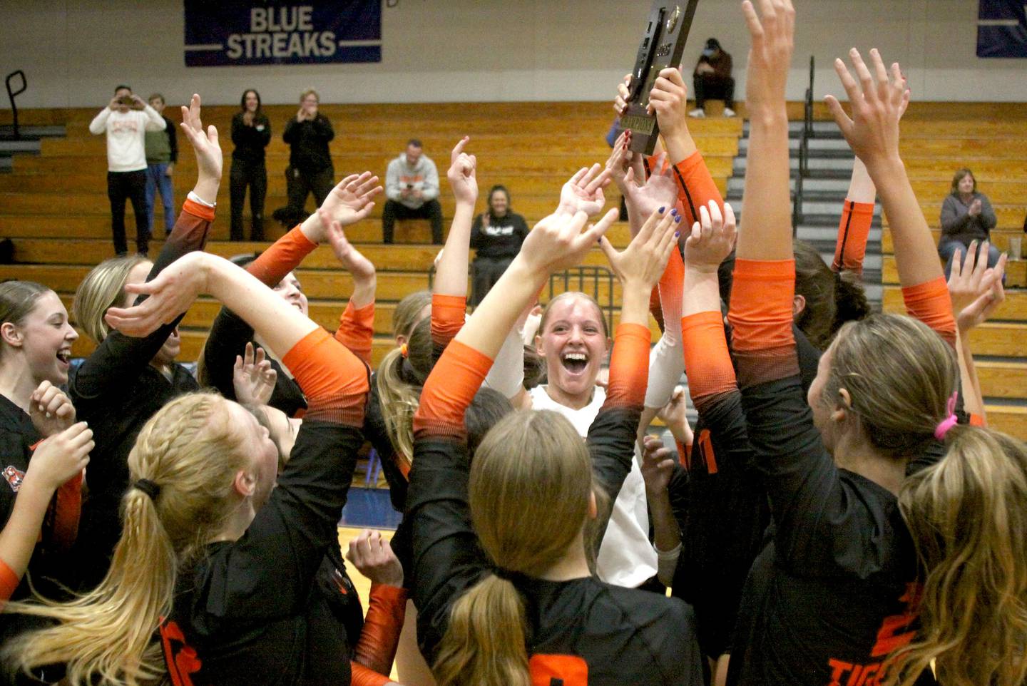 Crystal Lake Central’s Tigers get revved up after a two-set win over Woodstock North in IHSA girls volleyball Class 3A Regional Championship action at Woodstock High School in Woodstock on Thursday, October 30, 2025.