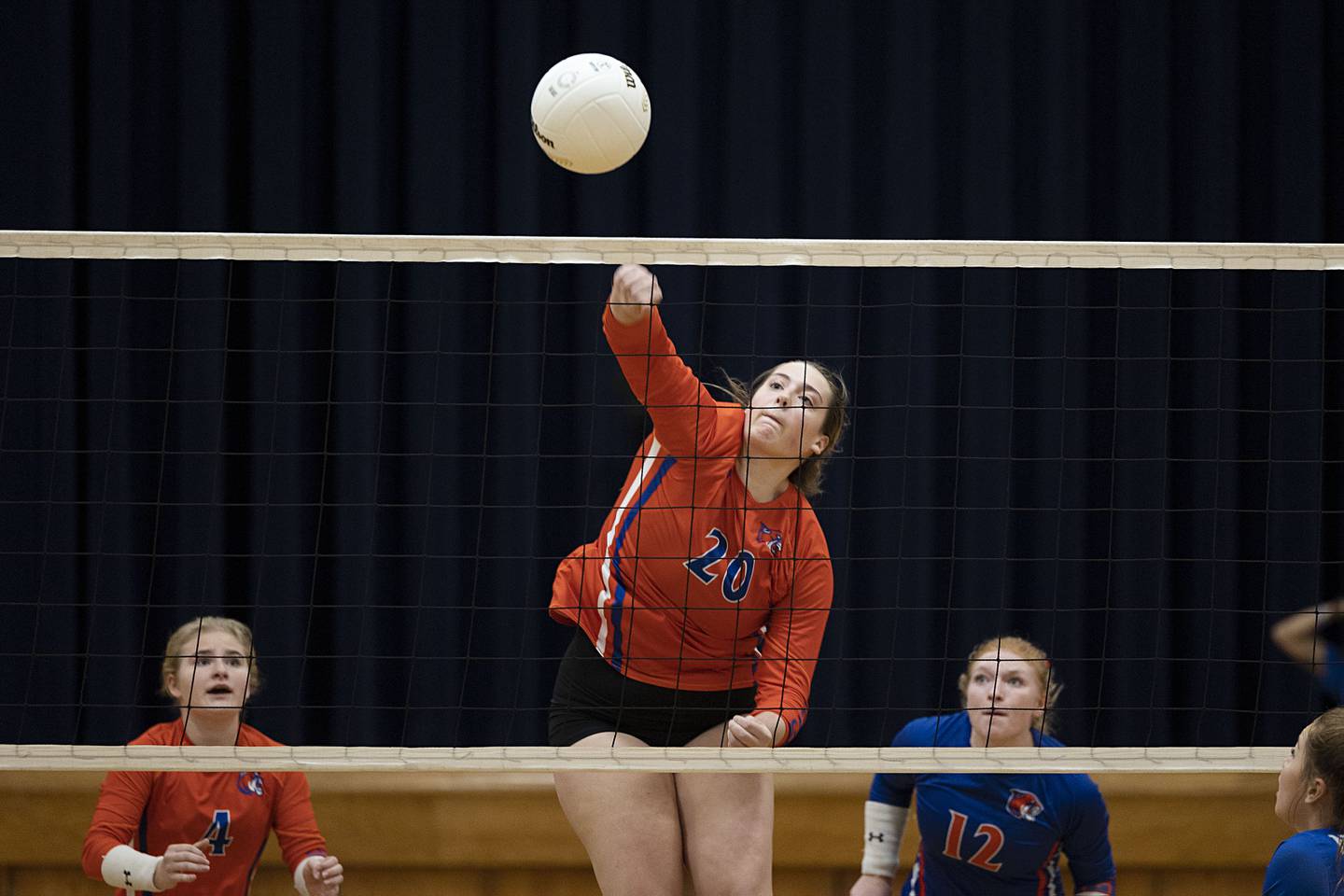 Eastland’s Quinc Haverland hammers the ball in game one Wednesday, Oct. 26, 2022 in the semifinal volleyball match against Newman.