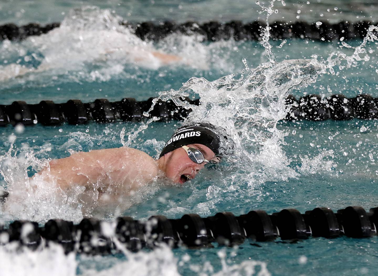 Cary-Grove’s Charlie Edwards competes in the 200 freestyle during the Fox Valley Conference Invitational swim meet on Saturday,  Feb. 15, 2025, at Woodstock North High School.