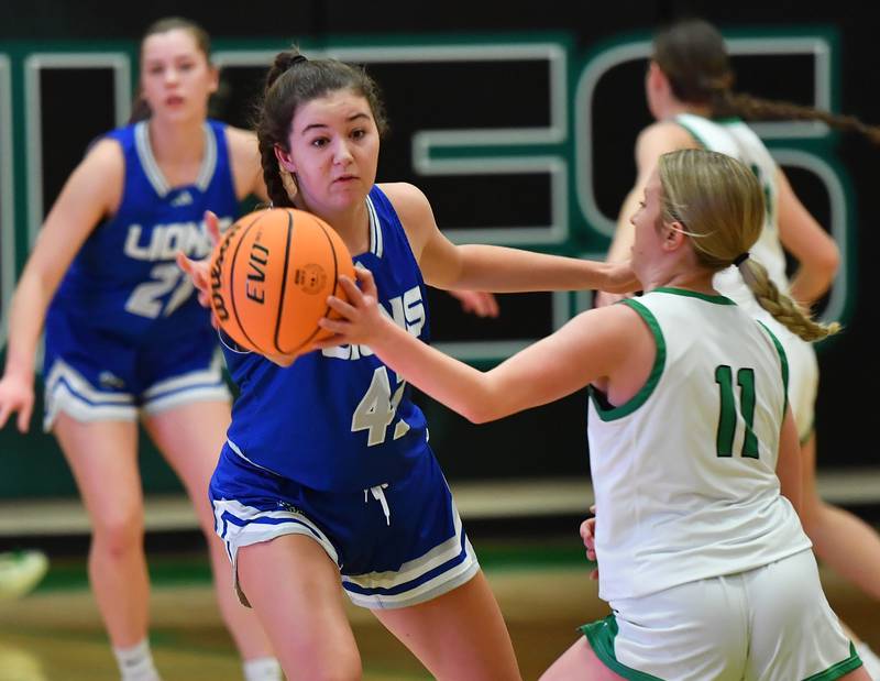 Lyons Township’s Emma O’Brien blocks a pass by York’s Briley O'Brien (11) during a game on February 4, 2025 at York High School in Elmhurst.