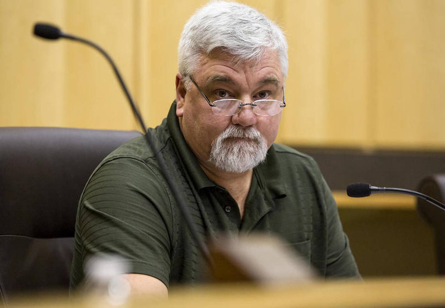 Elwood Village President Doug Jenco calls for public comment at a Village Board meeting on April 4 in Elwood.