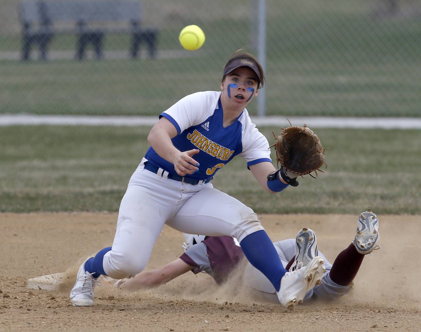 Johnsburg’s Brooke Klosowicz waits for the throw as Marengo’s Maddy Christopher slides into second base during a Kishwaukee River Conference softball game Tuesday, April 12, 2022, between Marengo and Johnsburg at Hiller Park in Johnsburg.