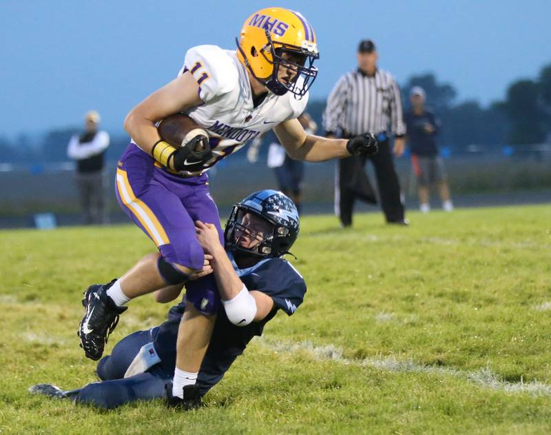 Mendota's Aden Tillman is brought down by Bureau Valley's Brice Helms on Friday, Sept. 22, 2023 at Bureau Valley High School.