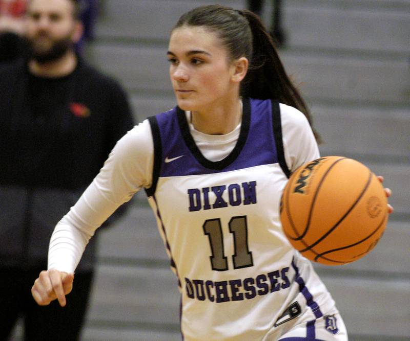 Dixon's  Kiley Gaither brigs the ball up court  . The Dixon Duchesses played  the Stillman Valley Cardinals in the third place game of the Dixon Holiday Tournament at Dixon High School on Monday, December 29th, 2025.