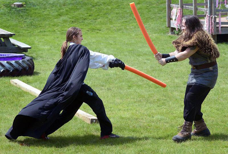 Logan and Jonathon Metzen display their joust skills during the Renaissance Faire as part of Marseilles Fun Days.