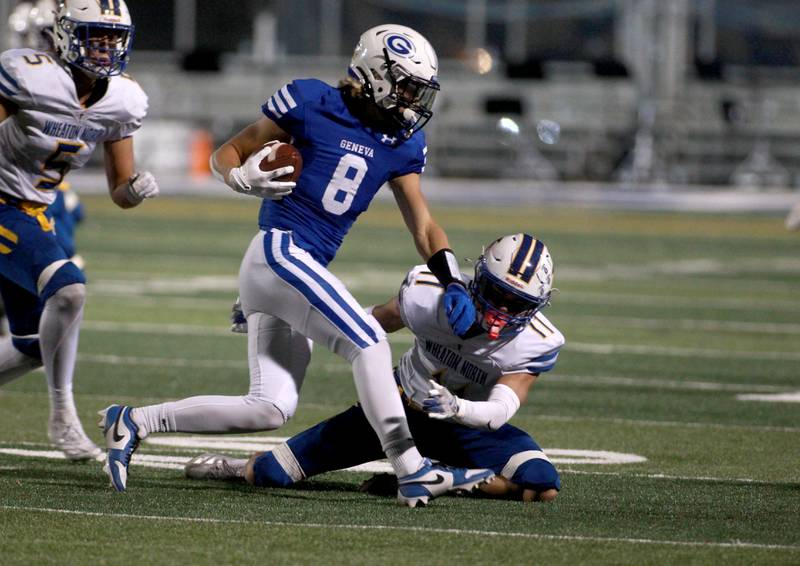 Geneva’s Finnegan Weppner runs the ball during a game against Wheaton North on Friday, Oct. 11, 2024 at Geneva.
