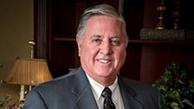 American Community Bank and Trust chairman announces retirement