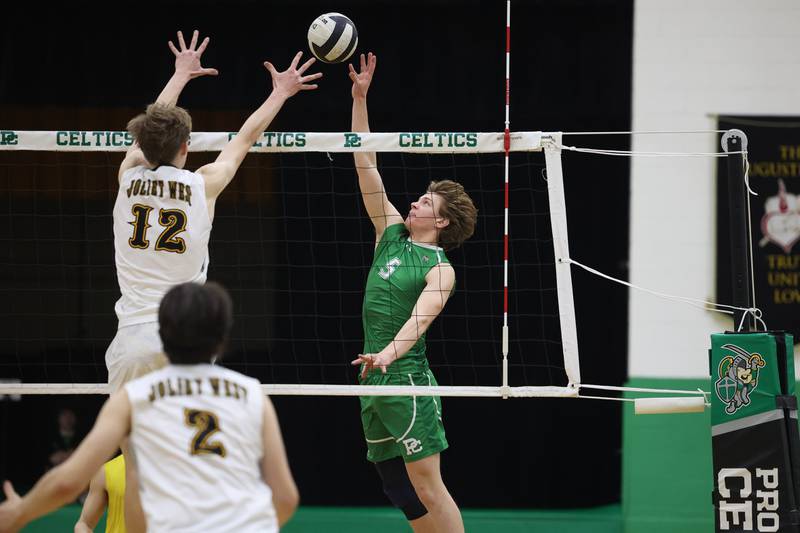 Providence’s Ethan Matton hits a shot against Joliet West on Tuesday, April 16, 2024 in New Lenox.