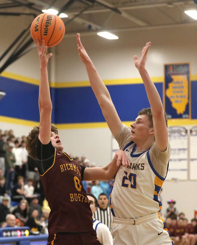 Richmond-Burton's Gavin Radmer shoots the over Johnsburg's Josh Kaunas during the IHSA Class 2A Johnsburg Regional Championship boys basketball game on Friday, February, 27, 2026, at Johnsburg High School.