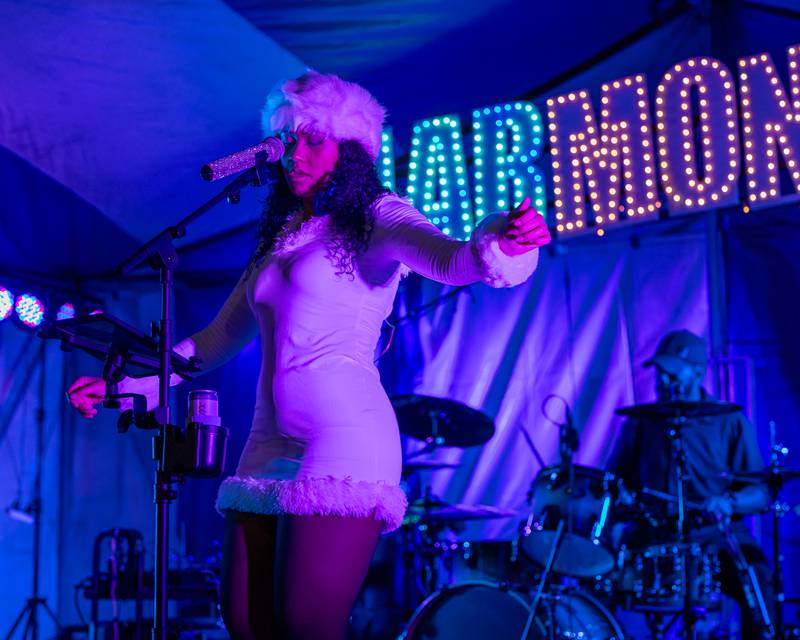 Cady Larson of Harmonix dances during the band's performance at Frosty on First on Friday, November 7, 2025 on First Street in La Salle.